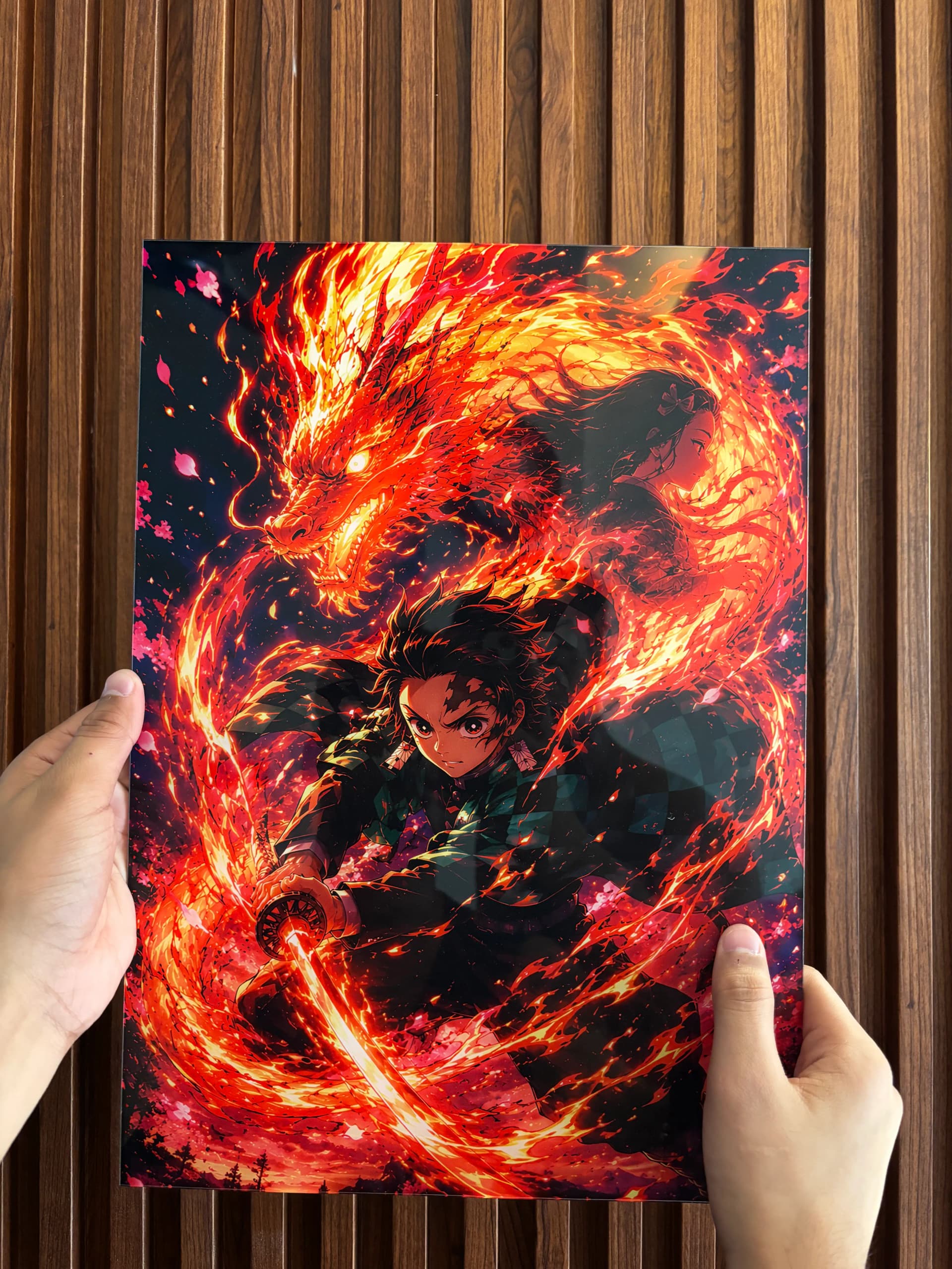 customer holding demon slayer art close up