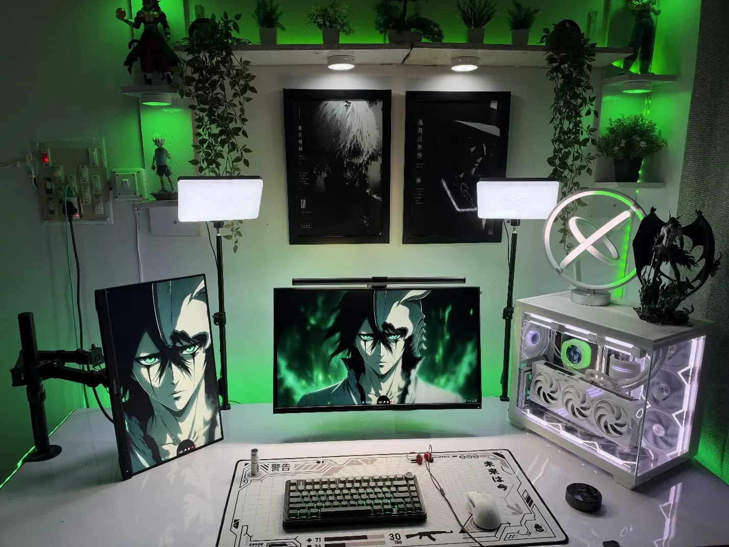 Framed Tokyo Ghoul and Demon Slayer posters on a customer's wall above a green-lit gaming desk