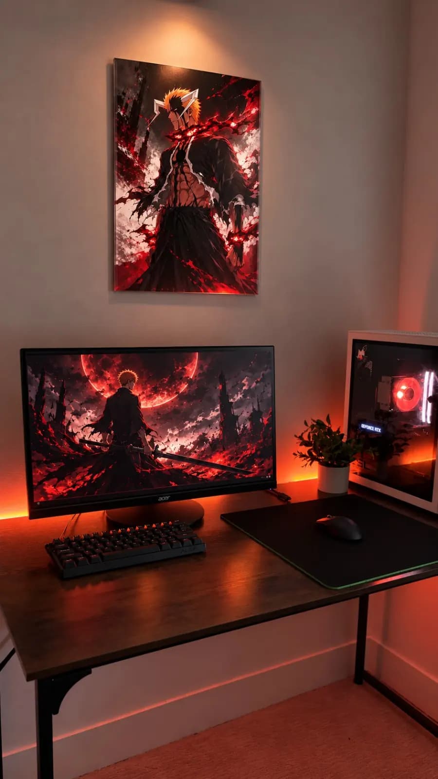 Customer's Bleach Ichigo acrylic print on the wall above a red-lit gaming desk